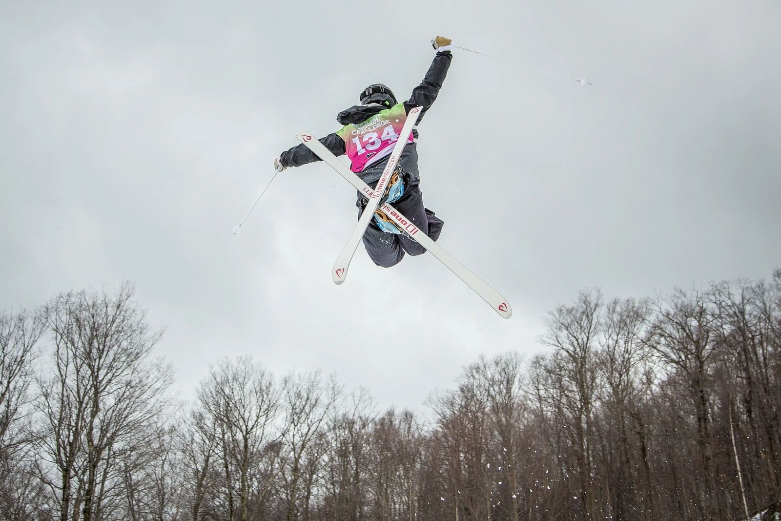 Skiers competing in the Bear Mountain Mogul Challenge on Outer Limits at Killington